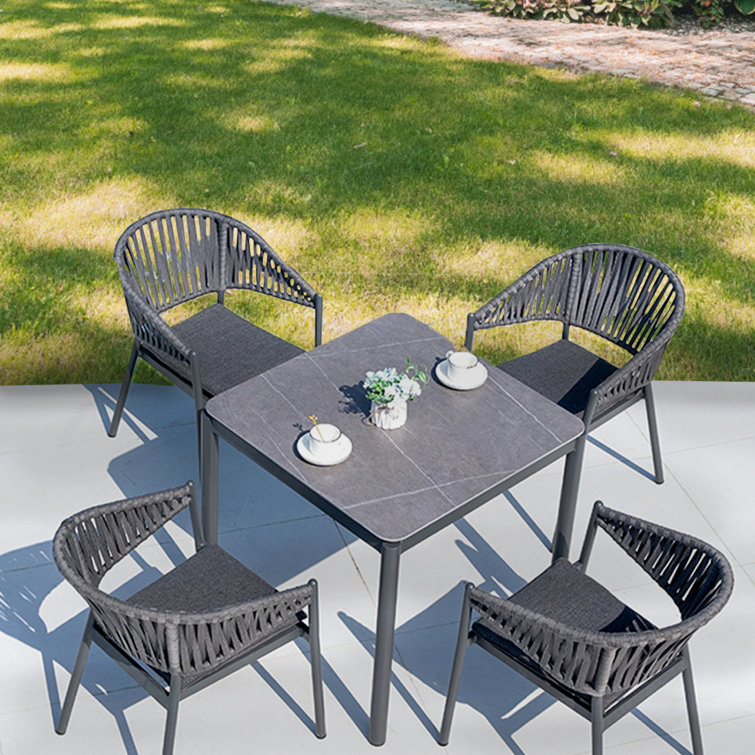 Aydrik 4 - Person Square Outdoor Dining Set with Cushions